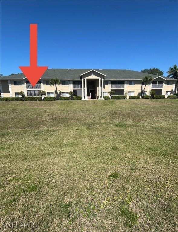 view of front of house with a front yard