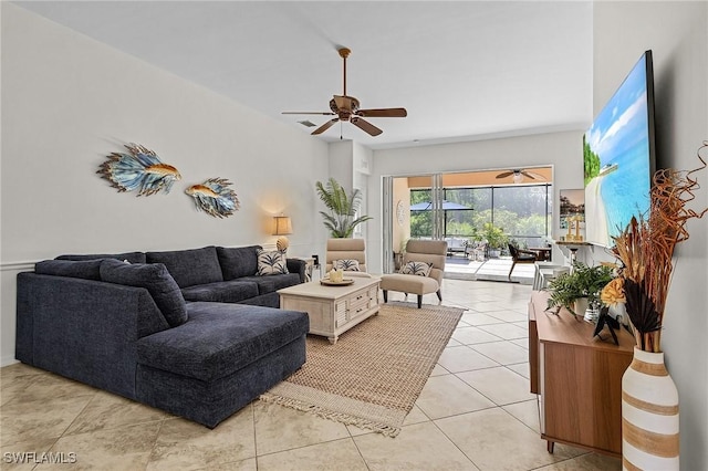 living room with light tile patterned floors and ceiling fan