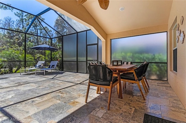 sunroom / solarium with vaulted ceiling