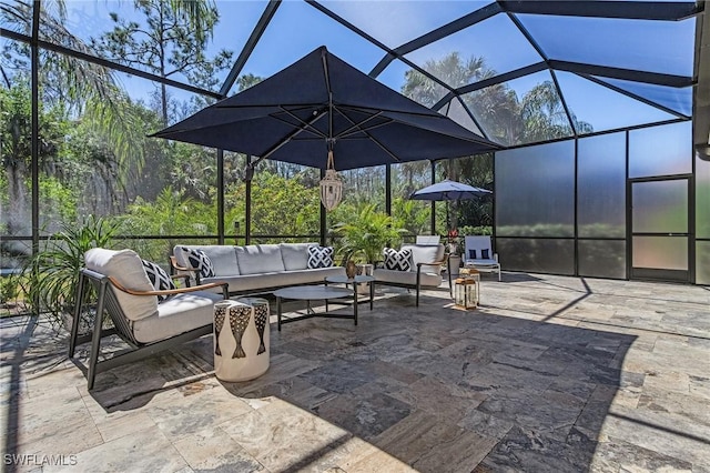 view of patio featuring a lanai and an outdoor living space