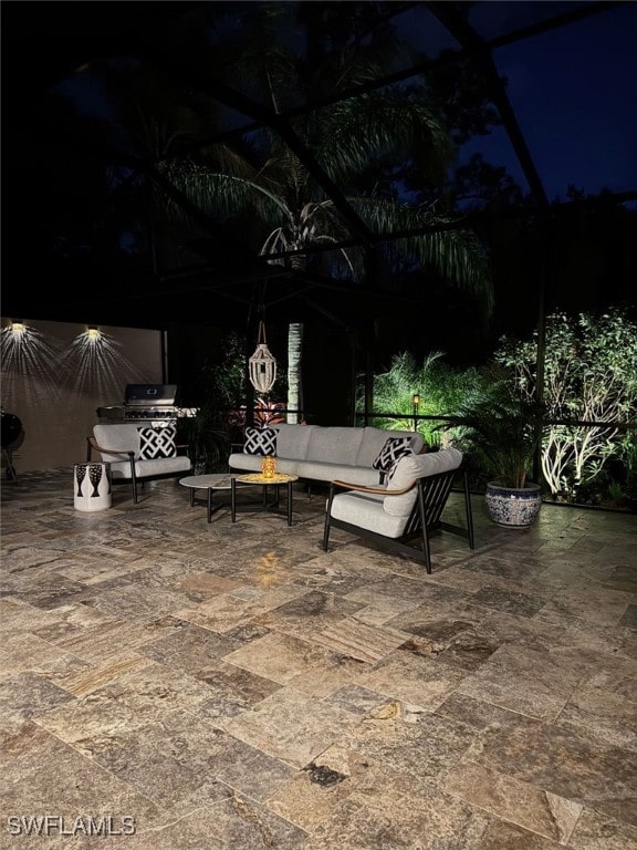 view of patio with area for grilling and an outdoor hangout area