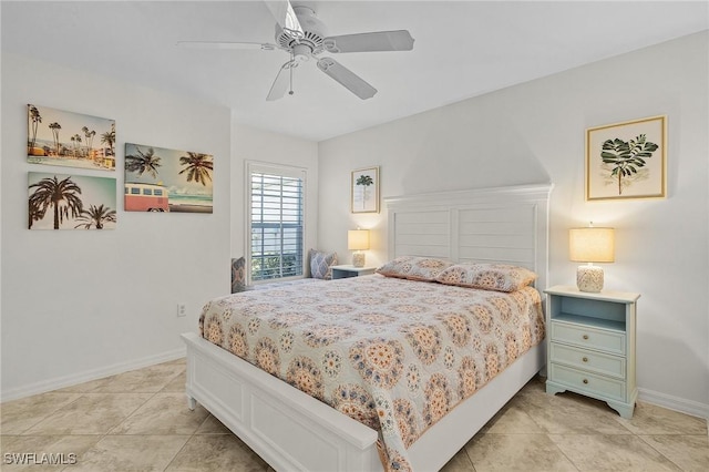 bedroom with light tile patterned floors, ceiling fan, and baseboards