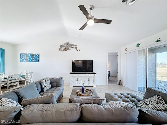 living room with visible vents, lofted ceiling, and a ceiling fan