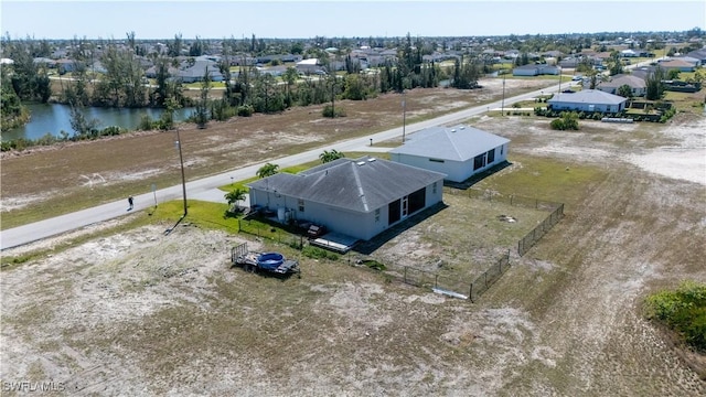 aerial view with a residential view and a water view