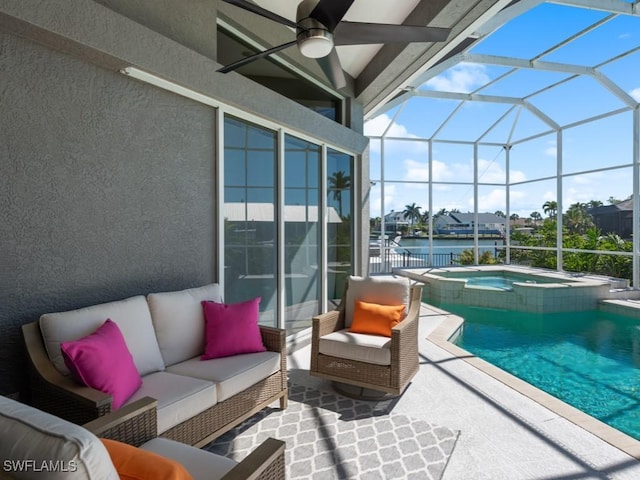 view of swimming pool featuring outdoor lounge area, glass enclosure, a patio area, and ceiling fan