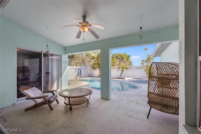 view of swimming pool featuring a patio area, a fenced in pool, a ceiling fan, and a fenced backyard