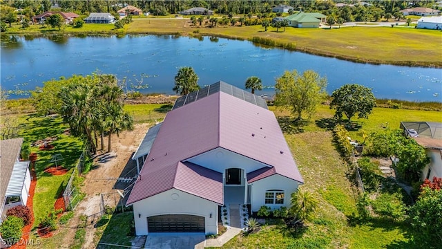 drone / aerial view featuring a water view