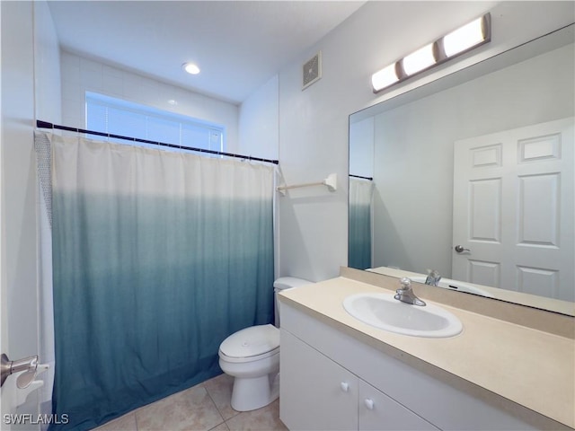 full bath with visible vents, toilet, a shower with shower curtain, tile patterned flooring, and vanity