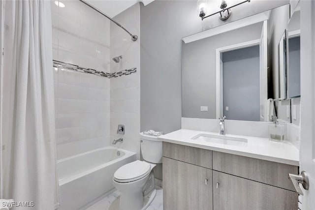 bathroom with shower / bath combination with curtain, vanity, toilet, and marble finish floor