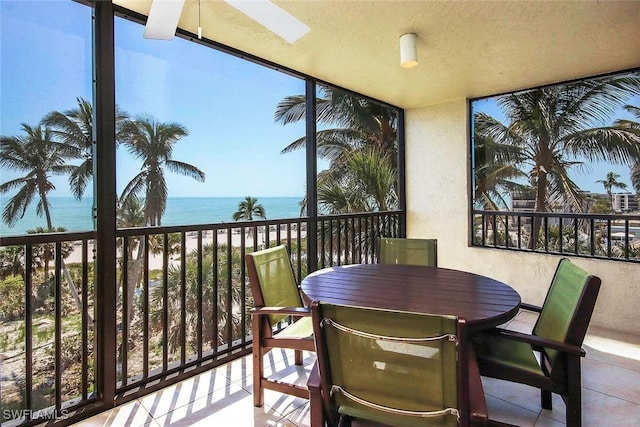 sunroom with a water view