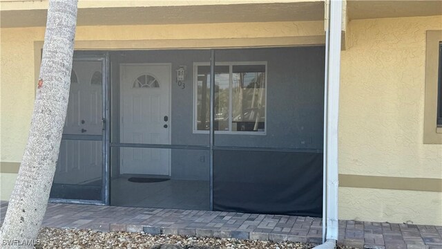 2510 SE 16th Pl Unit 103, Cape Coral, FL 33904 - property entrance featuring stucco siding
