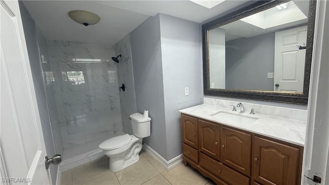 2510 SE 16th Pl Unit 103, Cape Coral, FL 33904 - bathroom featuring vanity, toilet, a marble finish shower, baseboards, and tile patterned flooring