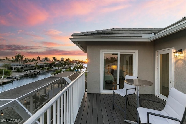 balcony featuring a water view