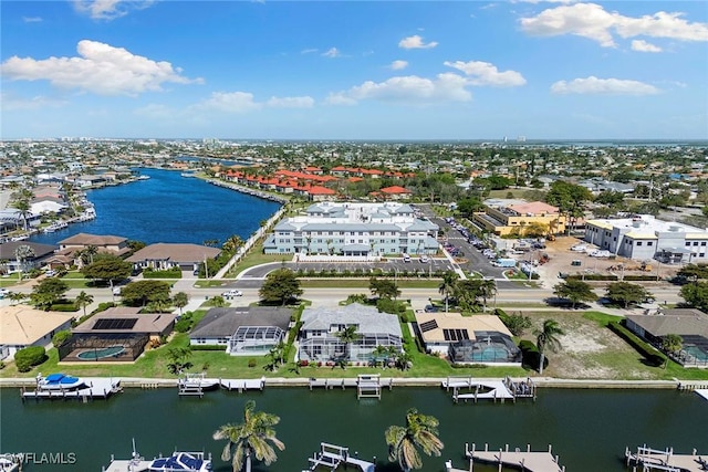 aerial view featuring a residential view and a water view