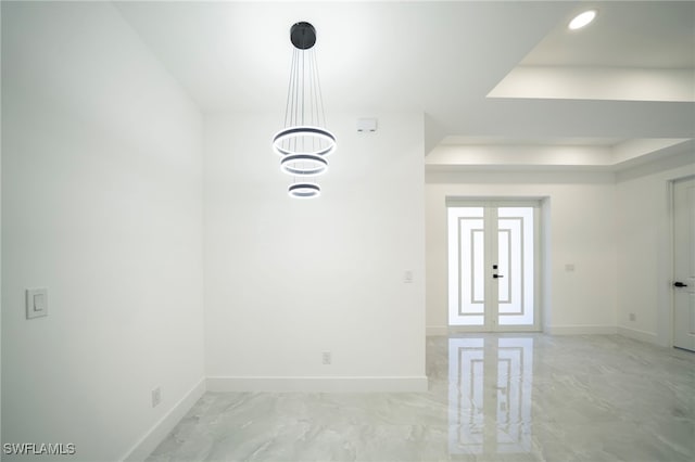 unfurnished room with recessed lighting, baseboards, and marble finish floor