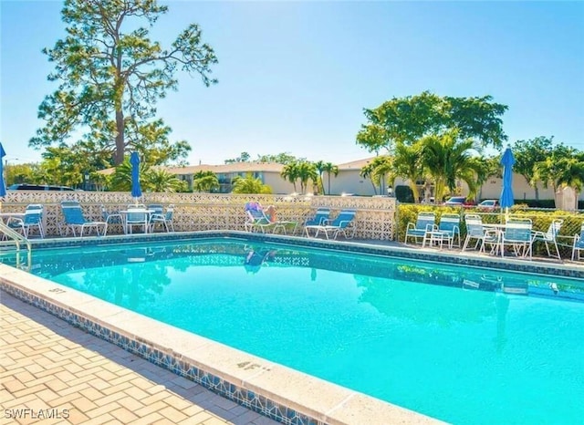 163 Palm Dr Unit 2878, Naples, FL 34112 - pool featuring fence