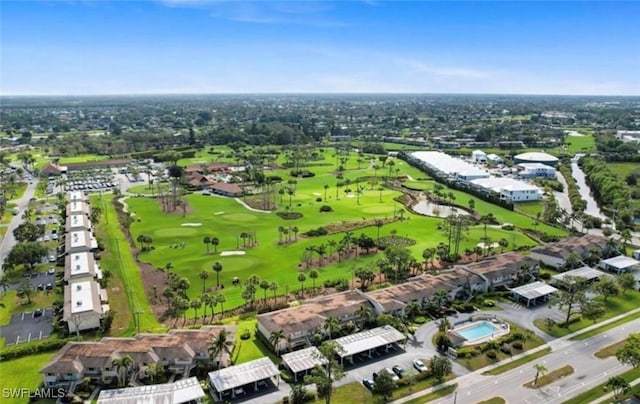 birds eye view of property featuring view of golf course