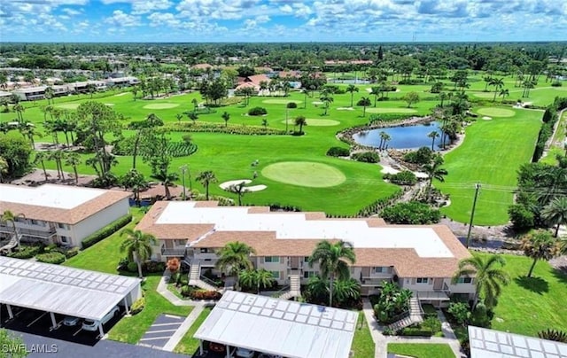 bird's eye view featuring a residential view, golf course view, and a water view