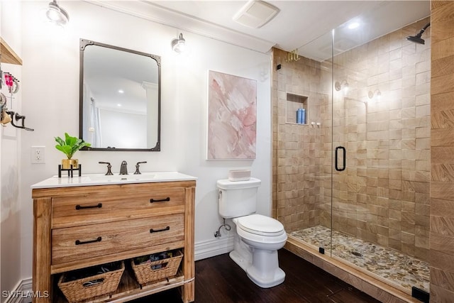13189 Valewood Dr, Naples, FL 34119 - bathroom with vanity, a shower stall, and wood finished floors