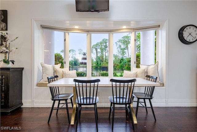 13189 Valewood Dr, Naples, FL 34119 - dining area featuring breakfast area and dark wood-type flooring