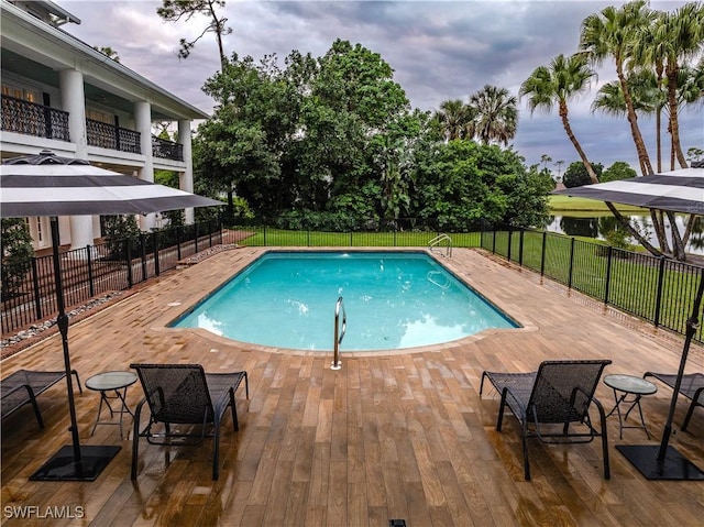 13189 Valewood Dr, Naples, FL 34119 - view of swimming pool with a patio area