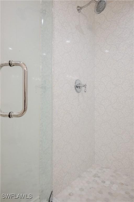 13189 Valewood Dr, Naples, FL 34119 - bathroom featuring a stall shower