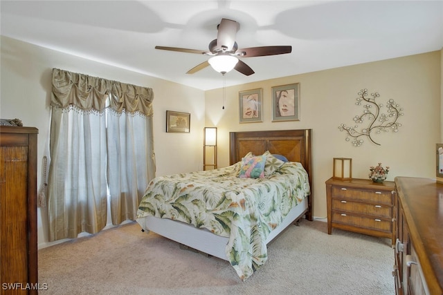 bedroom featuring carpet flooring and a ceiling fan