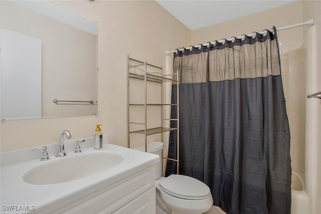 bathroom featuring toilet, vanity, and shower / bath combination with curtain