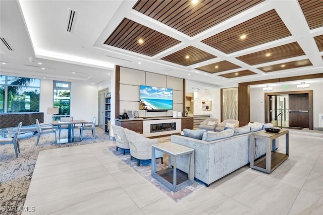 living area featuring recessed lighting, visible vents, and coffered ceiling