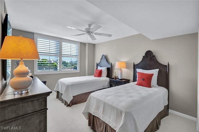 bedroom with carpet flooring, ceiling fan, and baseboards