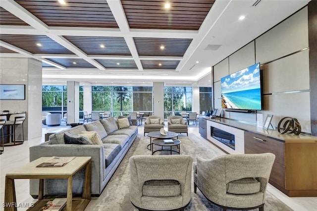 living room featuring visible vents, coffered ceiling, recessed lighting, floor to ceiling windows, and beamed ceiling