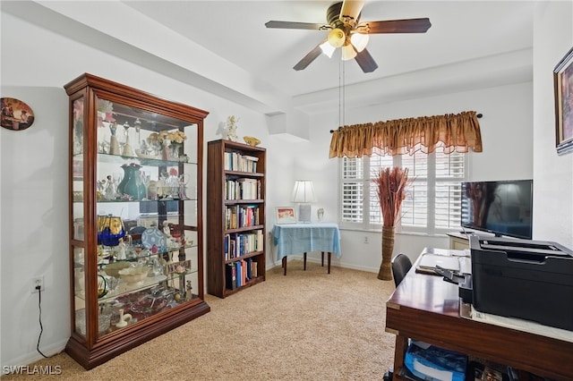 office area featuring baseboards, carpet, and a ceiling fan