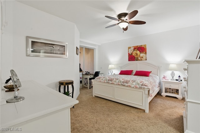 bedroom with light colored carpet and ceiling fan