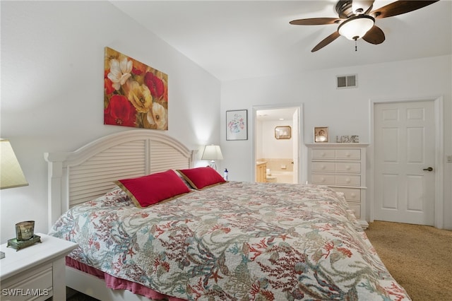 bedroom featuring visible vents, carpet floors, ensuite bath, and a ceiling fan