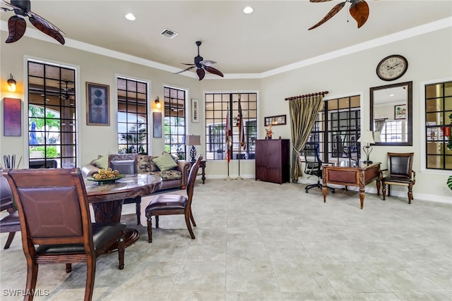 office area with crown molding, a ceiling fan, and visible vents