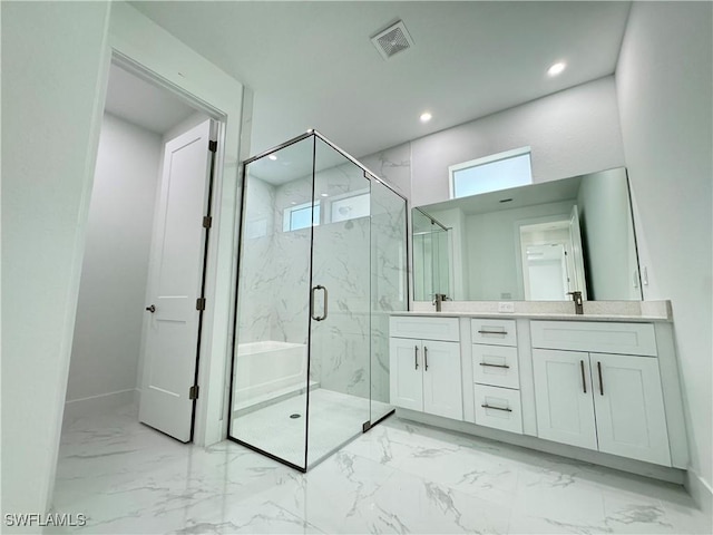 bathroom featuring a marble finish shower, visible vents, double vanity, marble finish floor, and a sink