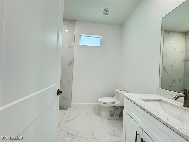 full bathroom with vanity, visible vents, baseboards, toilet, and marble finish floor