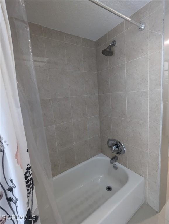 full bathroom featuring shower / tub combo with curtain