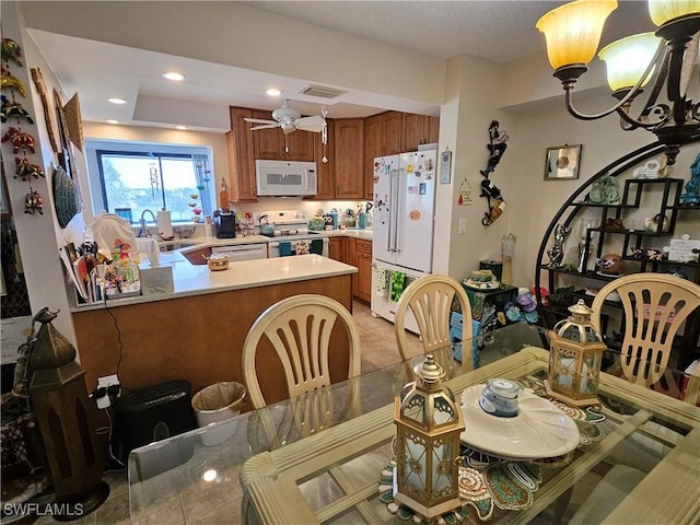 dining room with visible vents, recessed lighting, and ceiling fan with notable chandelier