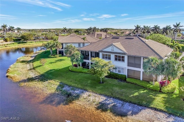 drone / aerial view with a water view