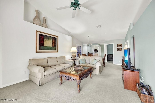 living area with baseboards, visible vents, lofted ceiling, light carpet, and ceiling fan with notable chandelier