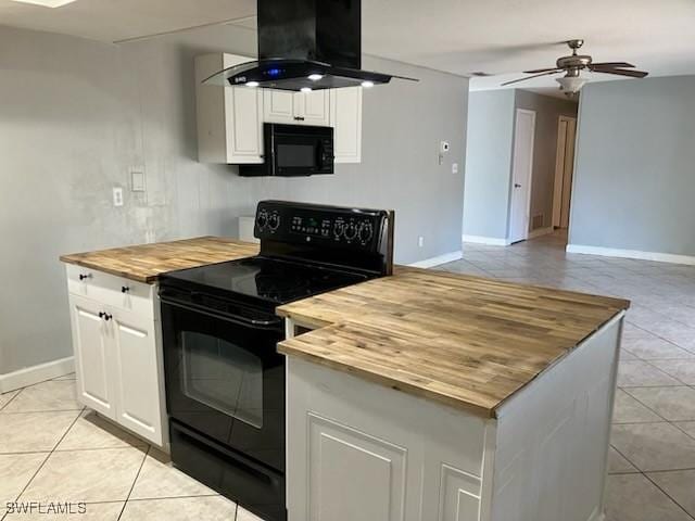 kitchen featuring butcher block countertops, black appliances, ventilation hood, light tile patterned floors, and ceiling fan