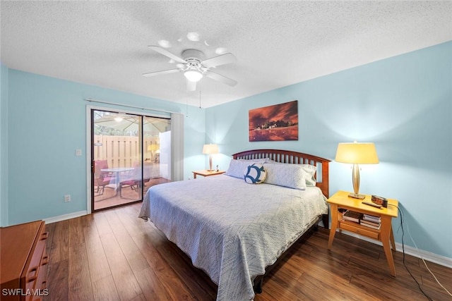 bedroom with access to exterior, hardwood / wood-style flooring, and baseboards