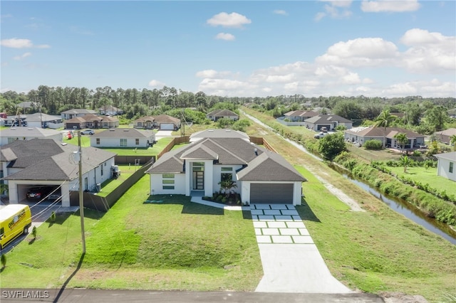 birds eye view of property with a residential view