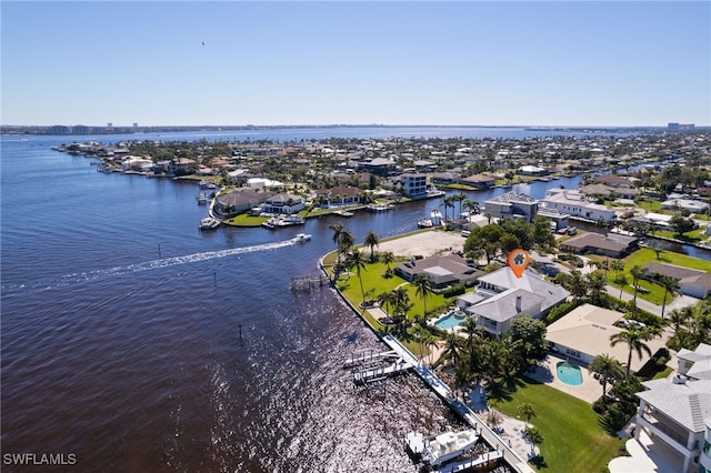 bird's eye view with a water view