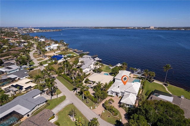 aerial view featuring a residential view and a water view