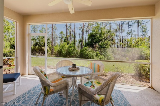 sunroom / solarium with ceiling fan