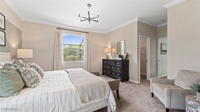 bedroom featuring a chandelier, baseboards, carpet floors, and ornamental molding