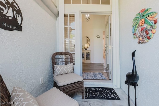 property entrance featuring stucco siding