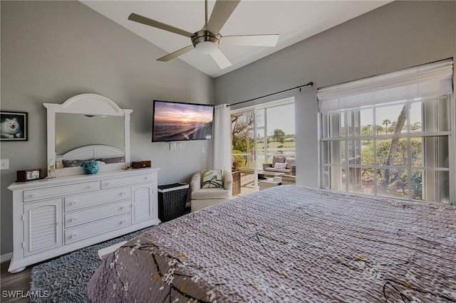 bedroom with wood finished floors, lofted ceiling, and ceiling fan